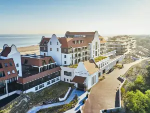 Hotel de Blanke Top