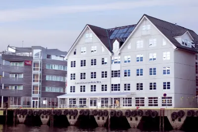 Home Hotel with Hoteles cerca de Catedral de Tromsø